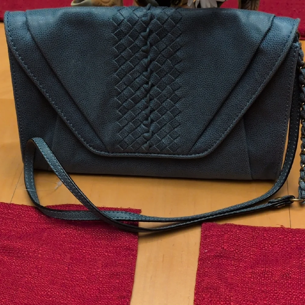 Elliott Lucca Teal Textured Clutch